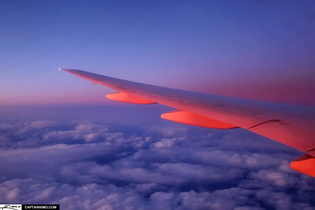 Aerial Photography from Airplane Window Flying Over Sea